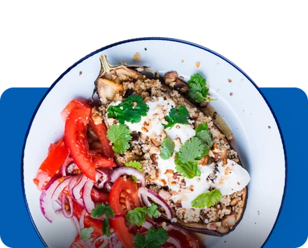 Stuffed eggplant with tomato salad